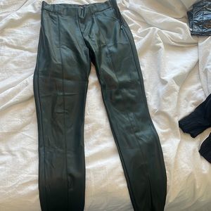 Olive green leather pants with zip detailing